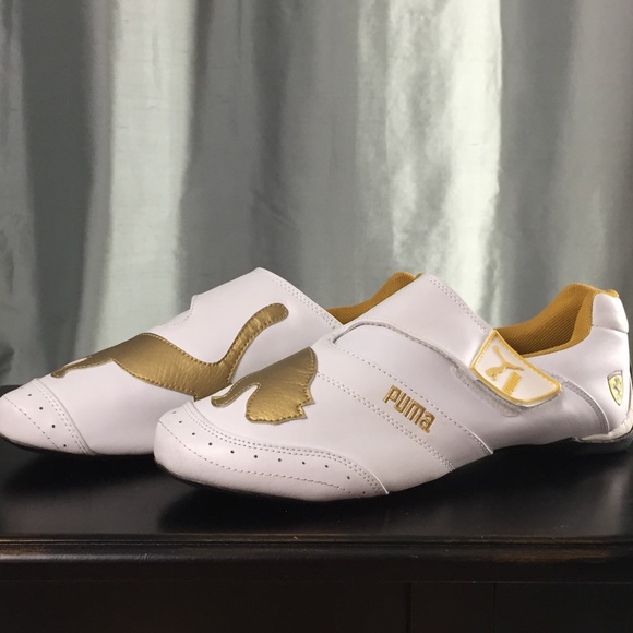 white puma shoes with gold